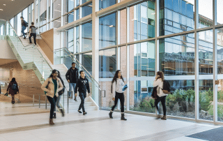 Students walking through the SLC.
