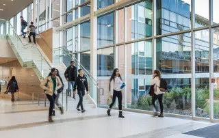 Students walking through the SLC.