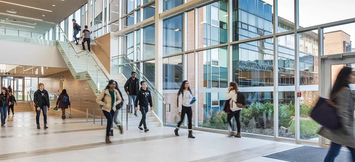 Students walking through the SLC.