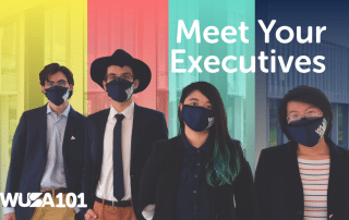 Four individuals wearing face masks and business attire stand side by side against a colorful, vertically striped background with the text "Meet Your Executives" and the logo "WUSA 101" displayed.