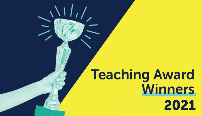 A hand holding a trophy is presented on a split background of dark blue and yellow. The text on the right reads, "2021 Winners: Teaching Award" in blue and yellow font, celebrating the WUSA Excellence in Undergraduate Teaching Award.