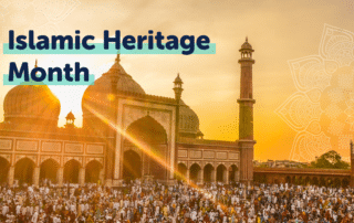 A large crowd gathers near an intricately designed mosque at sunset. The sky glows with a golden hue, and a mandala design decorates the upper right corner. Text overlay reads, "Islamic Heritage Month 2022.