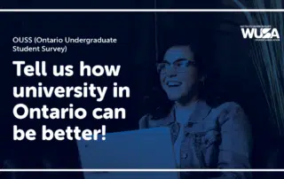 A smiling individual wearing glasses and a denim jacket is working on a laptop. Text on the image reads: "Ontario Undergraduate Student Survey - Tell us how university in Ontario can be better for a chance to win!" The WUSA (Waterloo Undergraduate Student Association) logo is also displayed.