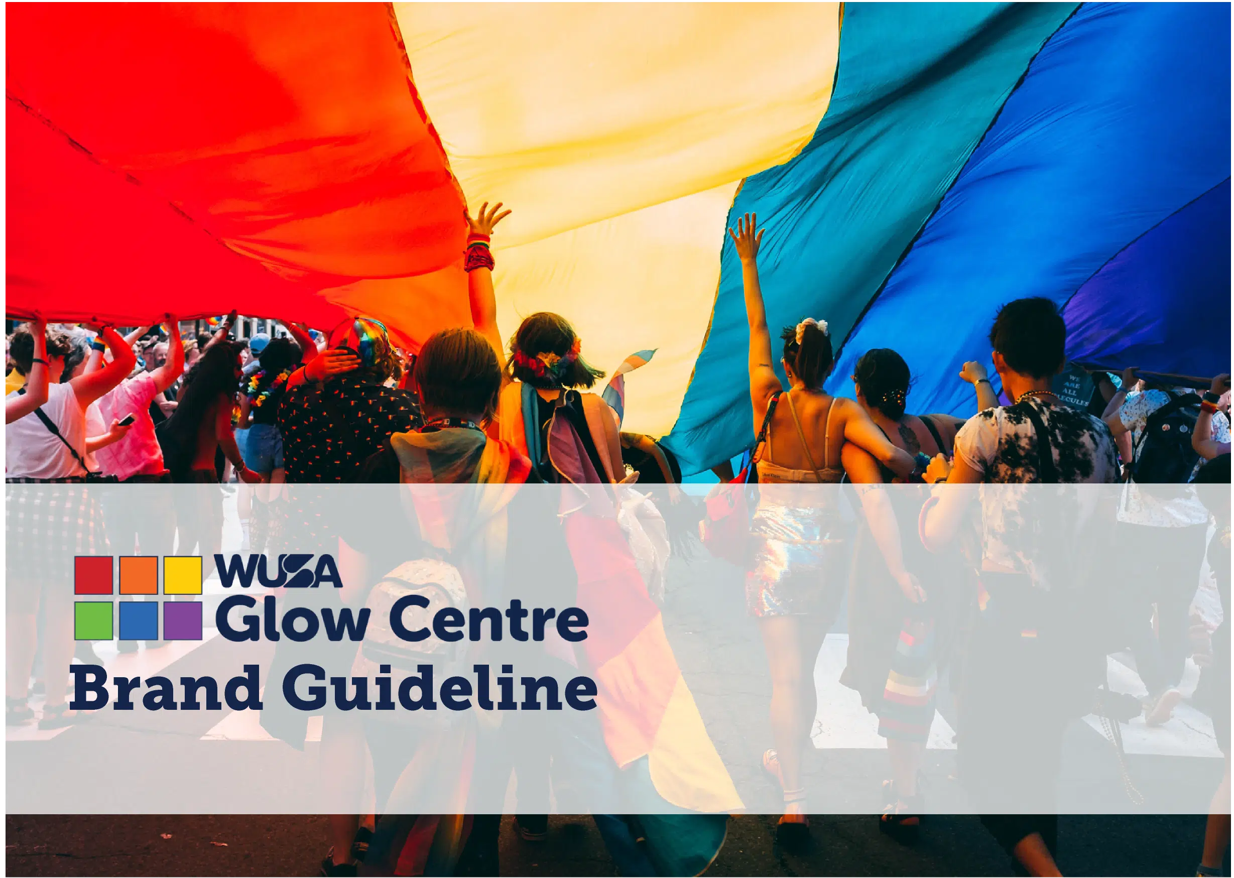 A large group of people is seen from the back walking under a giant rainbow flag held up over their heads. The image features the WUSA Glow Centre Brand Guideline text and logo, consisting of multicolored squares, at the bottom overlaying the image.