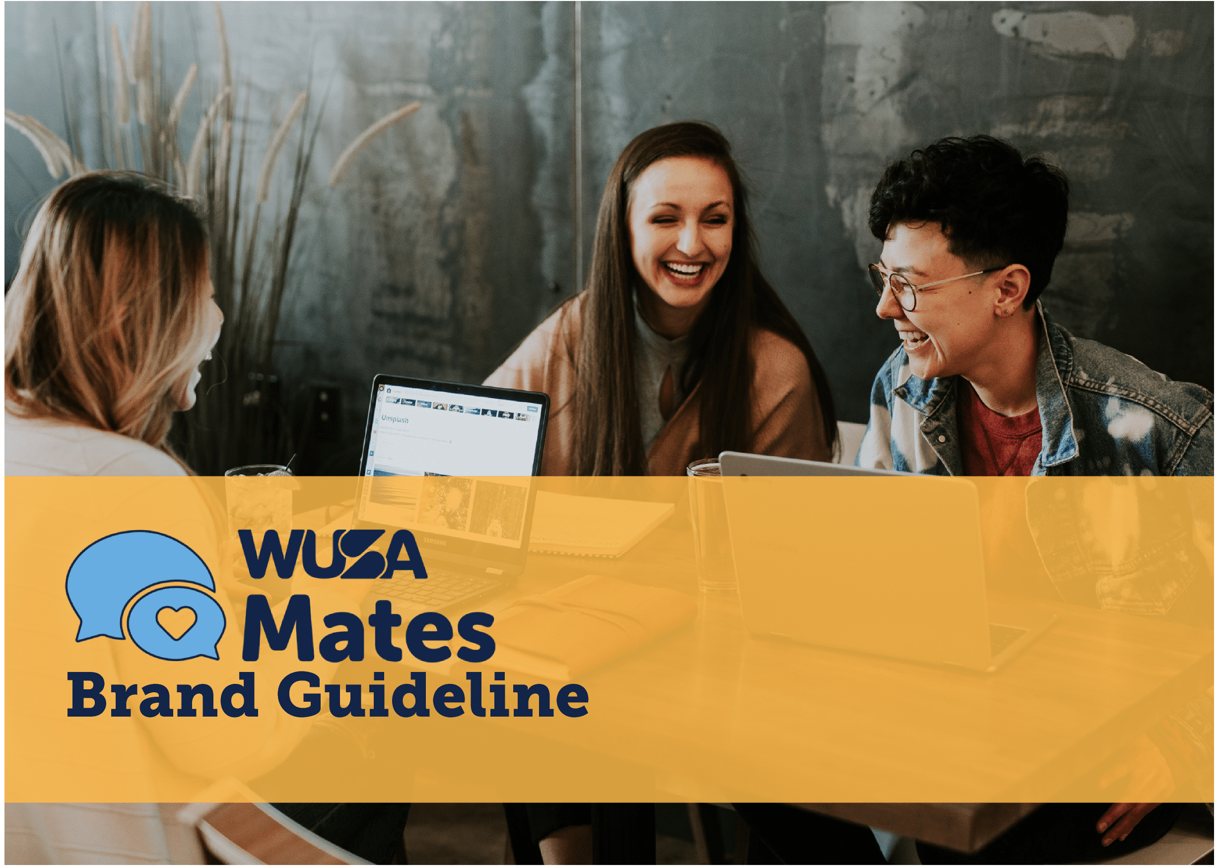 A group of three people smiling and working together at a table with laptops. A yellow banner across the bottom includes the text "WUSA Mates Brand Guideline" with a blue chat bubble and heart logo next to it.