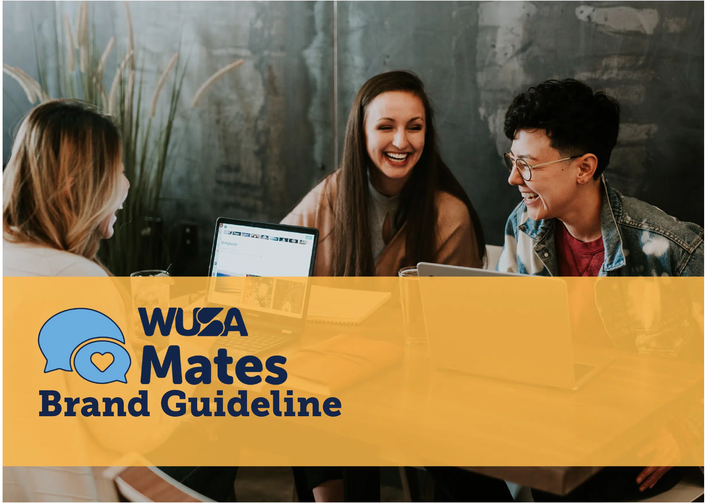 A group of three people smiling and working together at a table with laptops. A yellow banner across the bottom includes the text "WUSA Mates Brand Guideline" with a blue chat bubble and heart logo next to it.