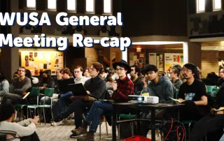 A group of people seated in rows indoors, attentively listening to a presentation. Some are holding notebooks and laptops. The brick walls and informational posters in the background suggest an academic environment. Text overlay reads, "WUSA General Meeting Recap.