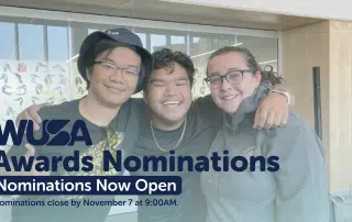 Three individuals are smiling and posing together indoors. The text overlay reads "WUSA Volunteer Awards Nominations" with a subheading "Nominations Now Open" and a note indicating that nominations close by November 7 at 9:00 AM.