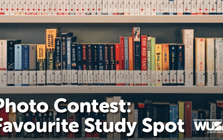 A bookshelf filled with various books displayed neatly. Text overlay at the bottom reads, "Photo Contest: Favorite Study Spot," with the Waterloo Undergraduate Student Association and WUSA logos in the corner. Review contest rules on our website for more details.