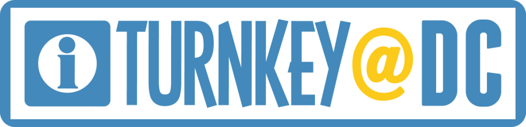 The image shows a logo with the text "TURNKEY @ DC" in blue and yellow on a white background. The word "TURNKEY" is in large blue letters with "@" in yellow, and there is a blue icon of an information symbol (i) in a square on the left.