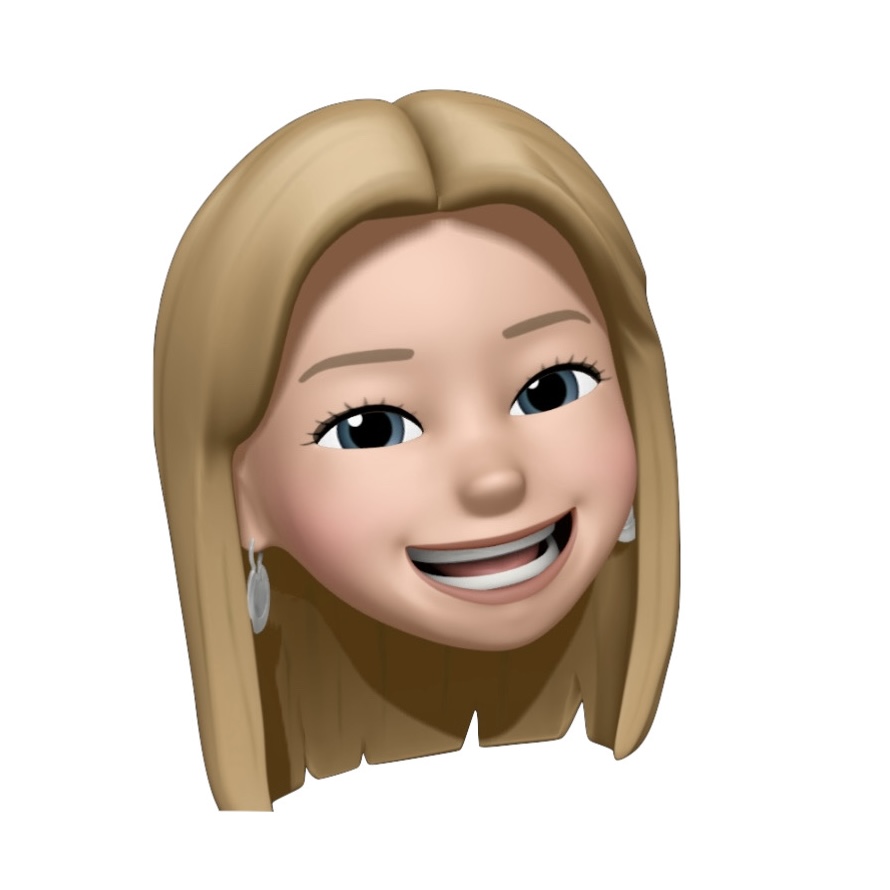 An animated emoji-style face with long blonde hair, light skin tone, and blue eyes. The face is smiling widely, showing teeth, with light pink lips. The character is wearing round silver earrings. The background is plain white.