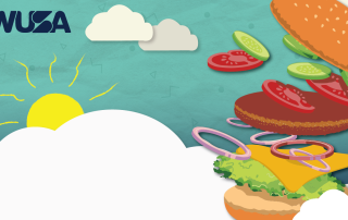 A burger with various ingredients like lettuce, cheese, onions, tomatoes, cucumbers, and a patty flying apart against a sky blue background with clouds and a sun. The word "WUSA" is in the top left corner.