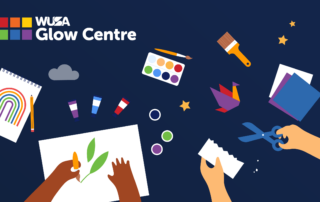 Art supplies and hands crafting against a navy background set the scene for some Monday Funday creativity at "WUSA Glow Centre.