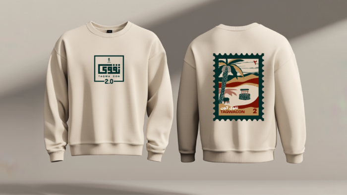 Beige sweatshirts featuring the "TaqwaCon 2.0" logo on the front and a postcard-style desert scene on the back. Perfect for UWMSA members looking to stay cozy in style.