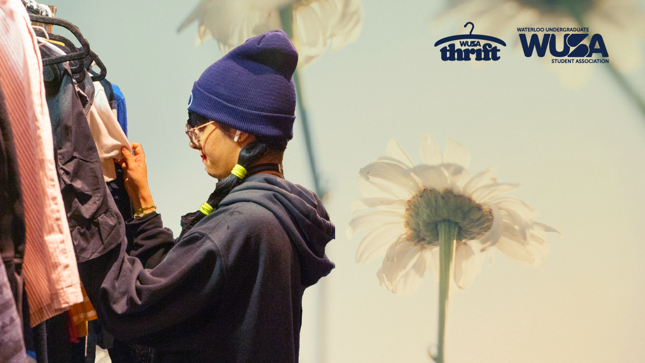 A person in a beanie browses clothes on a rack, surrounded by WUSA Thrift logos set against a vibrant, spring-inspired floral background.