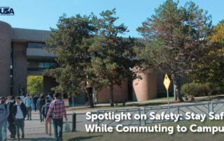 Students walking near a university building; the text emphasizes "Spotlight on Safety: Enhance Your Commute". Stay informed and prioritize safety while commuting to campus.