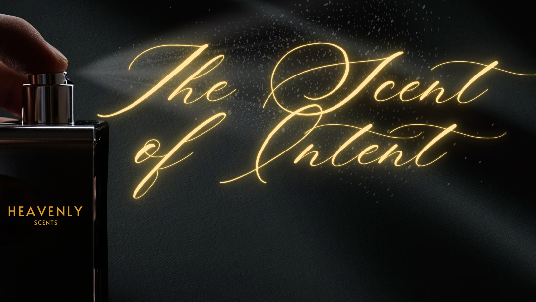 A hand sprays perfume from a black bottle labeled "Heavenly Scents" with golden text reading "The Scent of Intent," capturing the feeling of accomplishment at the End of Term.