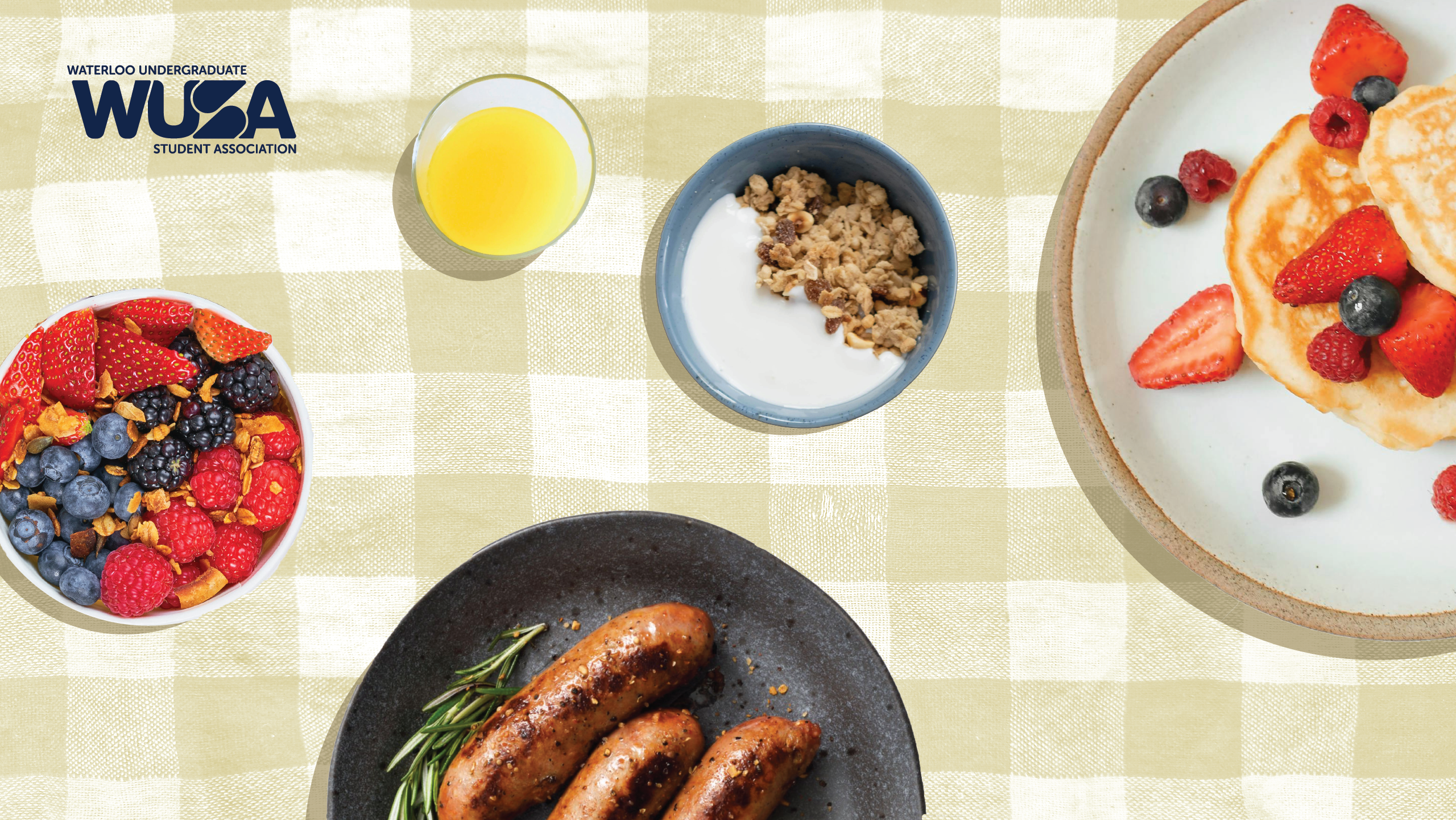 A Welcome Brunch spread features sausages, pancakes with berries, granola, juice, and a berry parfait on a checkered cloth.