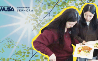 Two women serve food onto plates at the Welcome Brunch, a WUSA event sponsored by Sephora, set against a bright, leafy background.