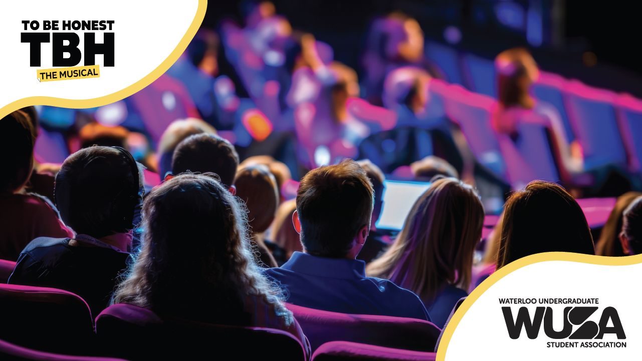 Audience sits in theater seats watching a stage; TO BE HONEST: The Musical and WUSA logos are visible, capturing the excitement of its premiere performance.