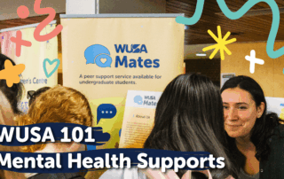 A student talking to another student at a Mates booth with the title WUSA 101: Mental Health Supports.