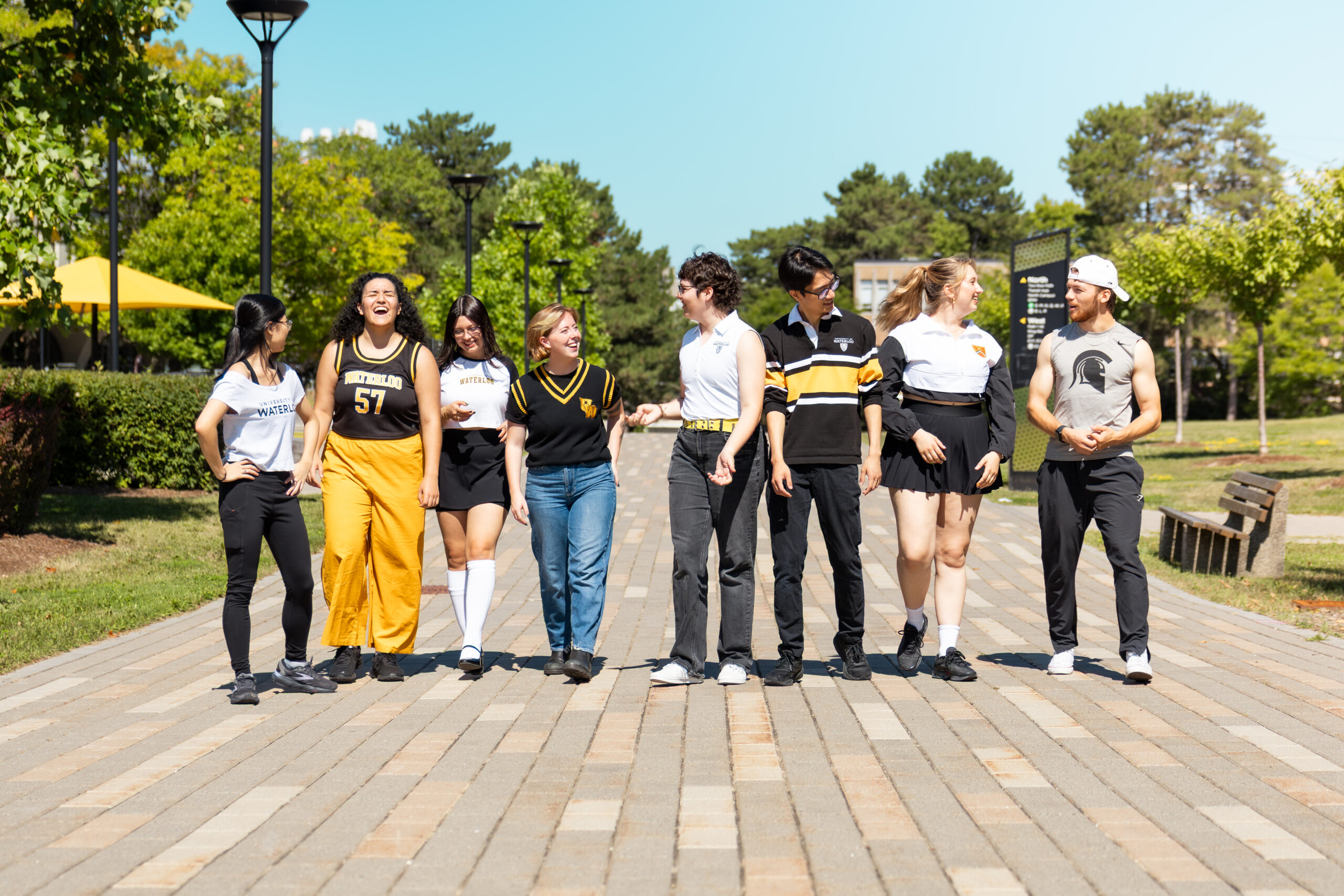 TBH cast walking across campus