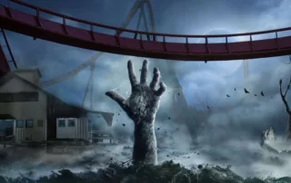 A zombie hand rises from the ground in a foggy, eerie Halloween theme park with a roller coaster and full moon—a chilling scene perfect for WUSA’s spooky festivities.