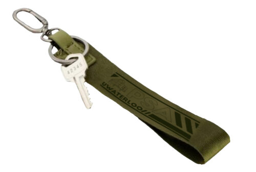 Show your Planning Student Association pride with this olive green wristlet lanyard, featuring "PSA UWaterloo" text printed on the fabric loop—perfect for keys and everyday use.