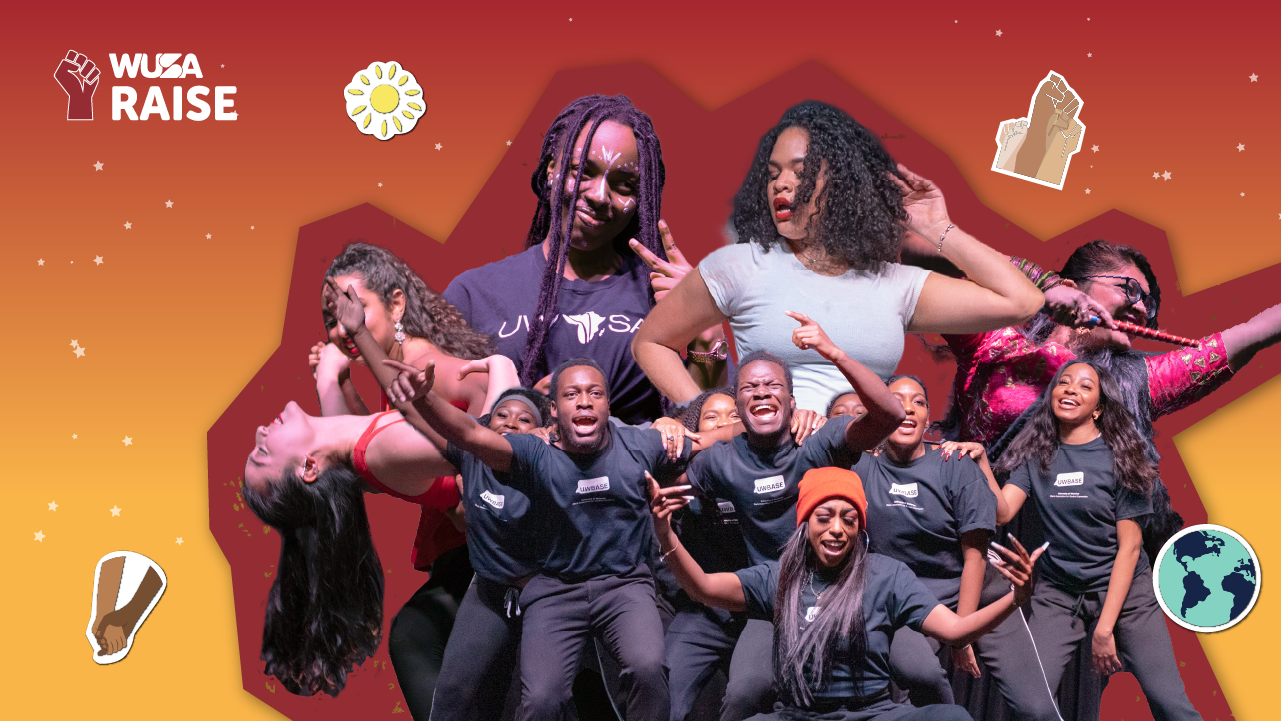 Web A diverse group of people dance energetically on stage at the Raise Cultural Caravan, surrounded by colorful stickers and a vibrant red-orange background.