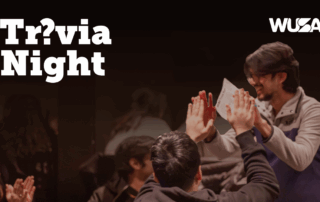 People high-fiving at a lively Trivia Night event, with "Trivia Night" and "WUSA" text featured on the image.