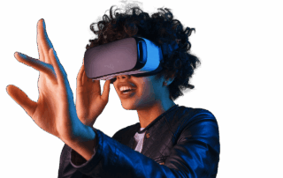Person wearing a VRealm VR headset, reaching out with one hand and smiling against a white background.