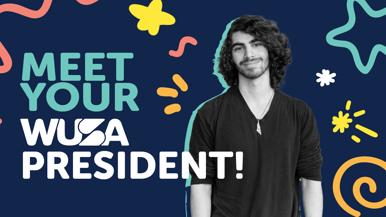 WUSA President Damian Mikhail, a young man with long curly hair stands against a navy background with swirl and star doodles, with the title "Meet Your WUSA President".