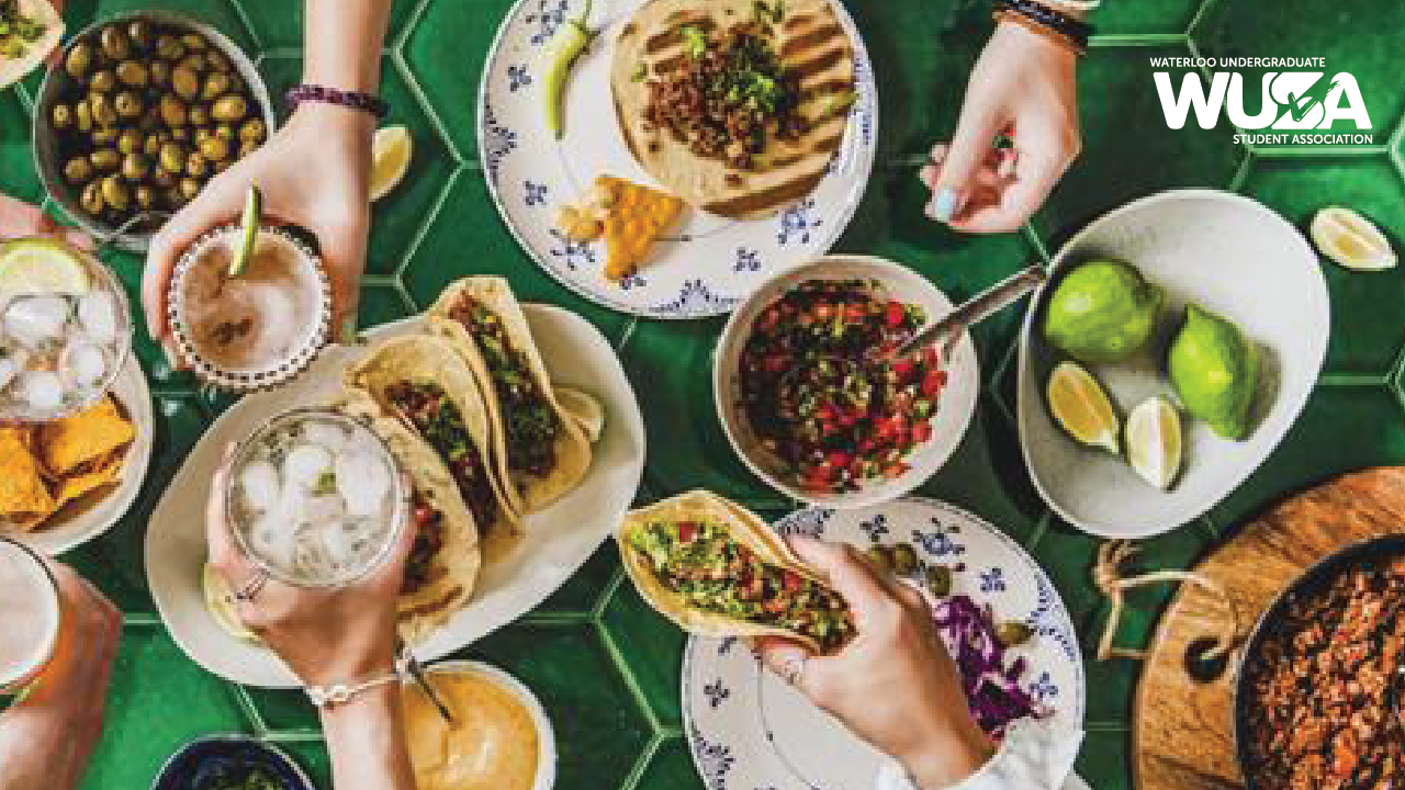 Hands sharing Taco, salsa, and drinks around a green-tiled table—perfect for recruitment events; Waterloo Undergraduate Student Association logo.