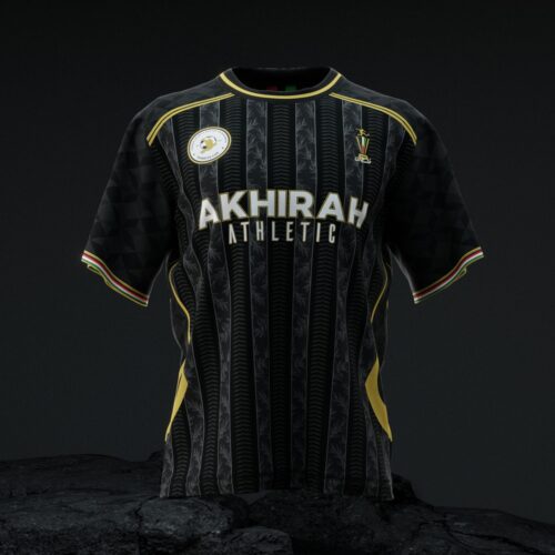 The Inter-MSA Soccer Tournament Jersey, featuring black and gold colors and "AKHIRAH ATHLETIC" text, is showcased on a dark rocky surface.