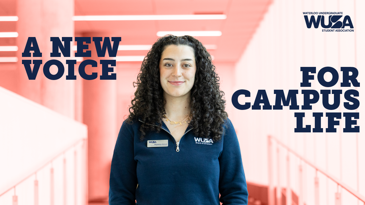 MajArticle-01 (1) Woman in navy WUSA sweater smiles in bright hallway; text reads “A New Voice for Campus Life.” Meet Majdalen Azouz, your new VP of Student Experience, dedicated to enhancing student experience on campus.